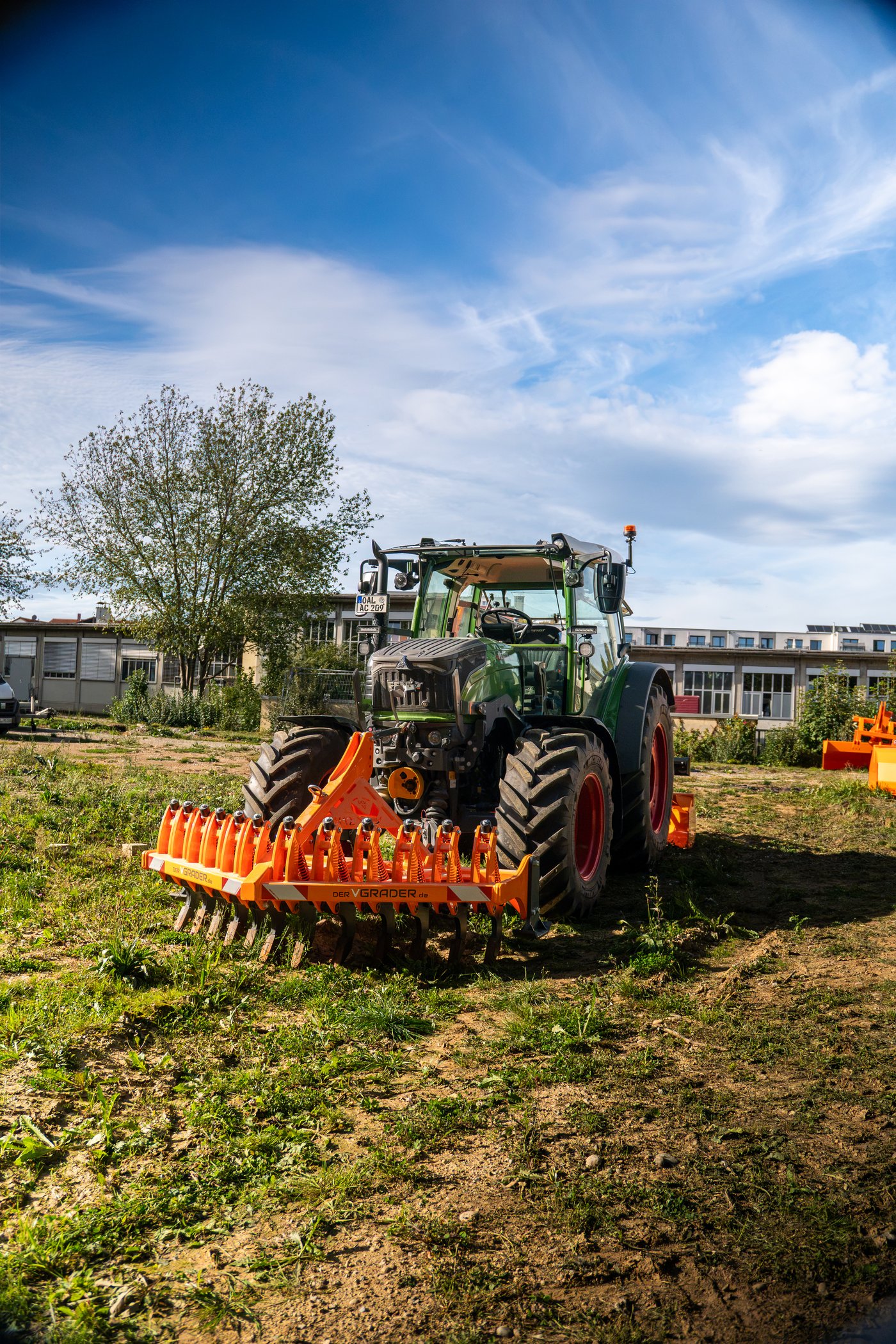 V12 ripper at work, mounted at the front of the tractor
